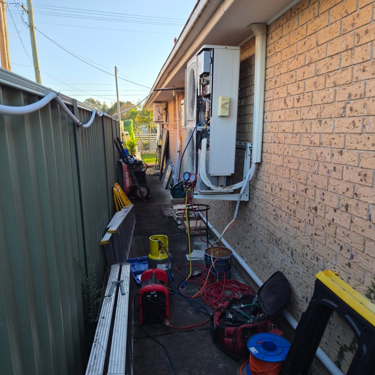 Old ducted outdoor unit being decommissioned before replacement at a Mount Druitt home.